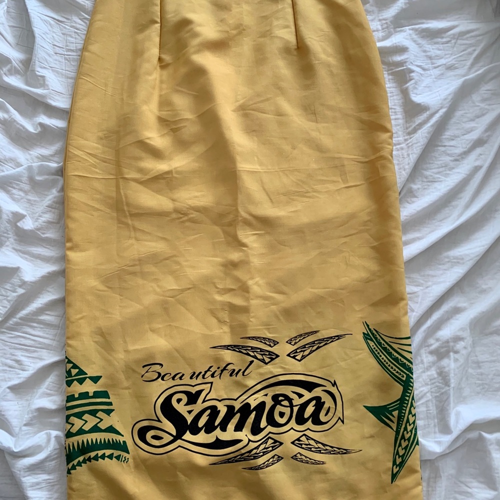 Pleated Yellow maxi skirt with Samoa details